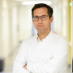 Professional portrait of Dr. Sebastian Bauer.